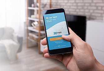 Smartphone mit M-net hilft App